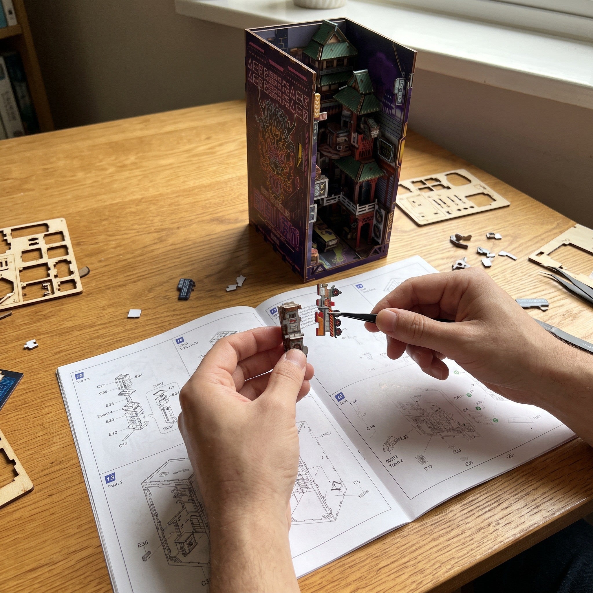 Hands adding small pieces beside a printed guide