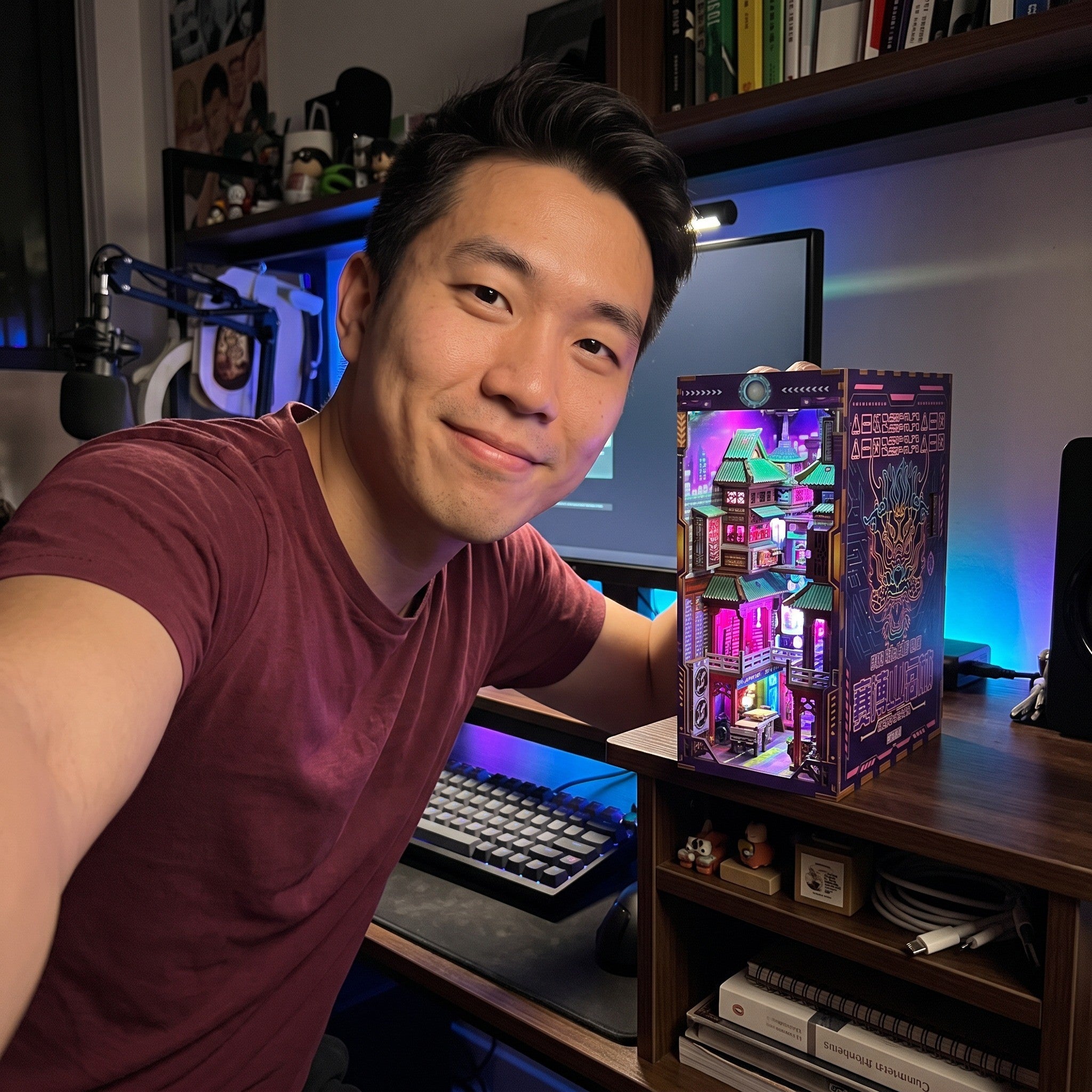 Man taking a selfie beside his gaming room book nook